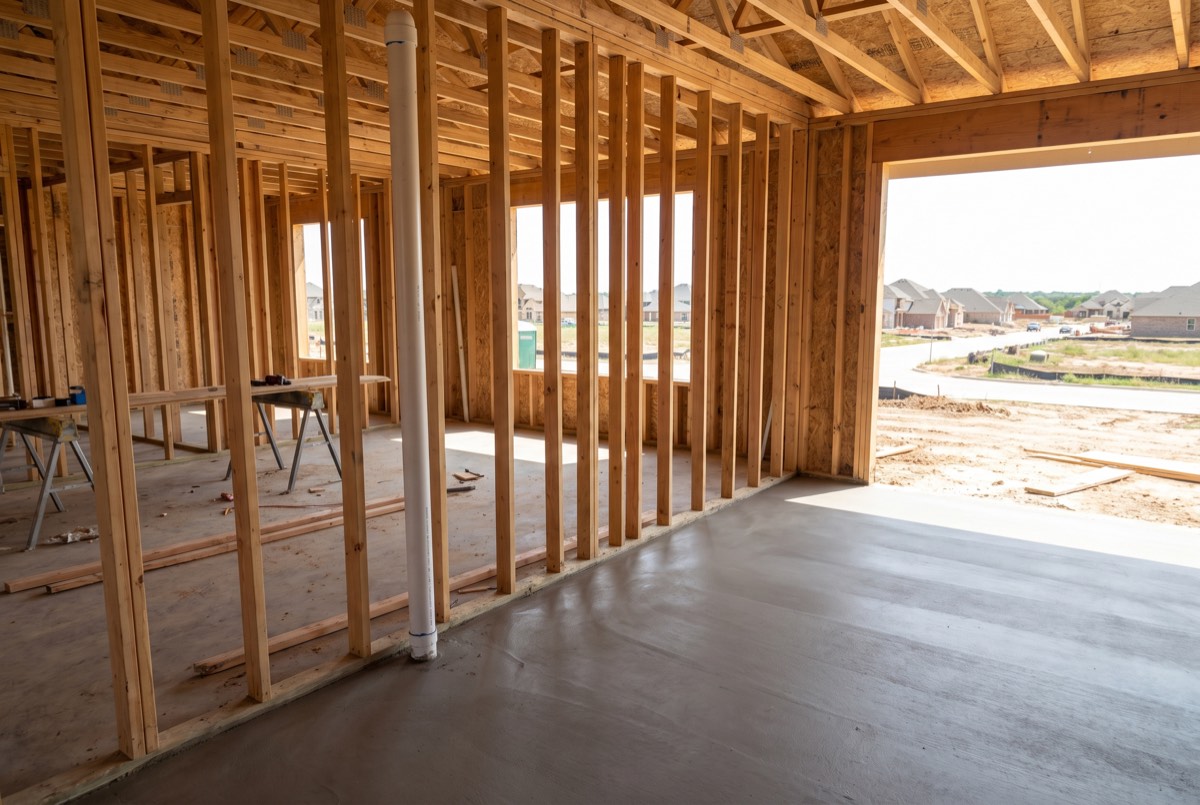 Capped radon rough-in pipe running through new home framing in a Dallas area new build